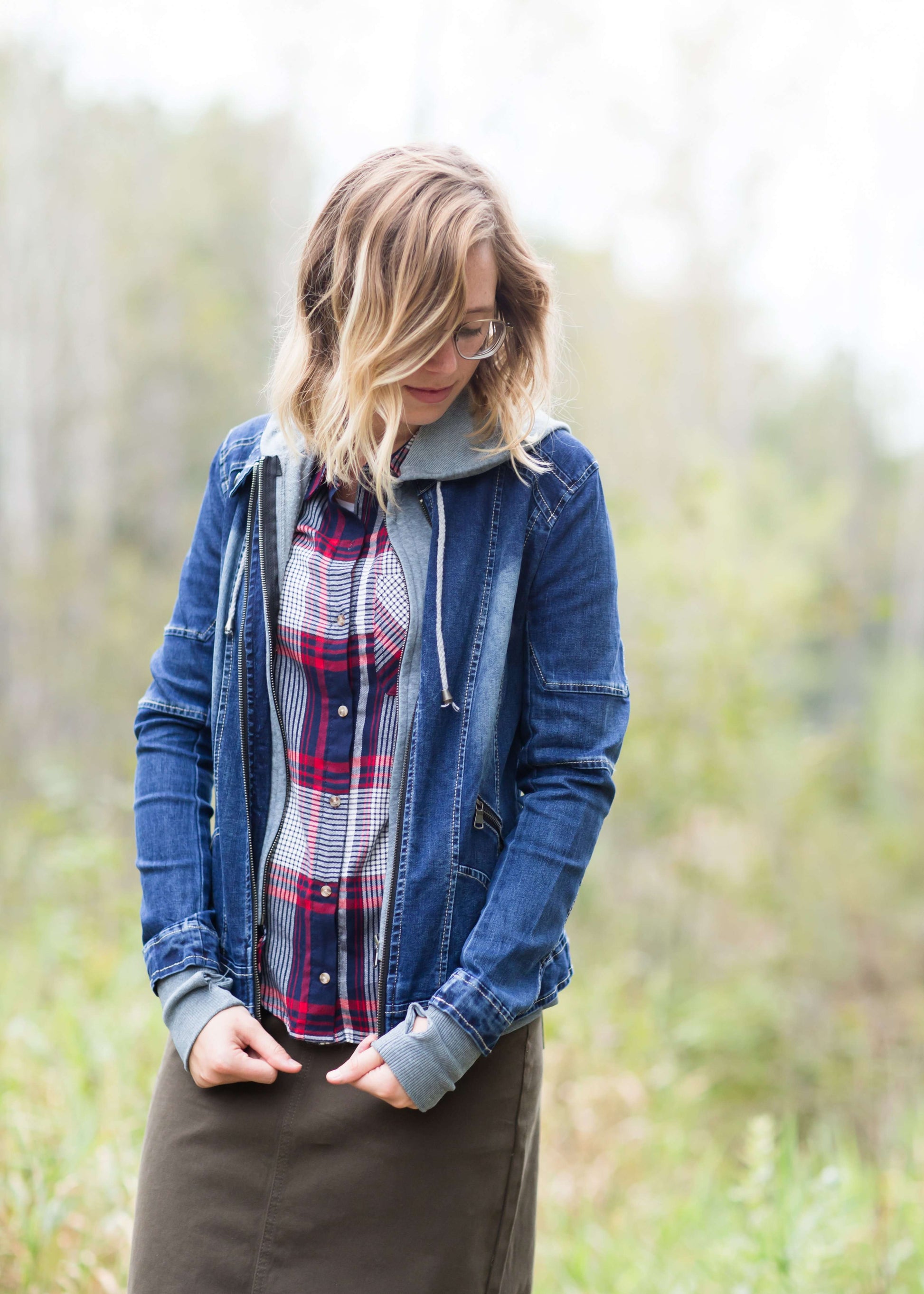 Denim front-zip jacket with removable gray front liner and hood.