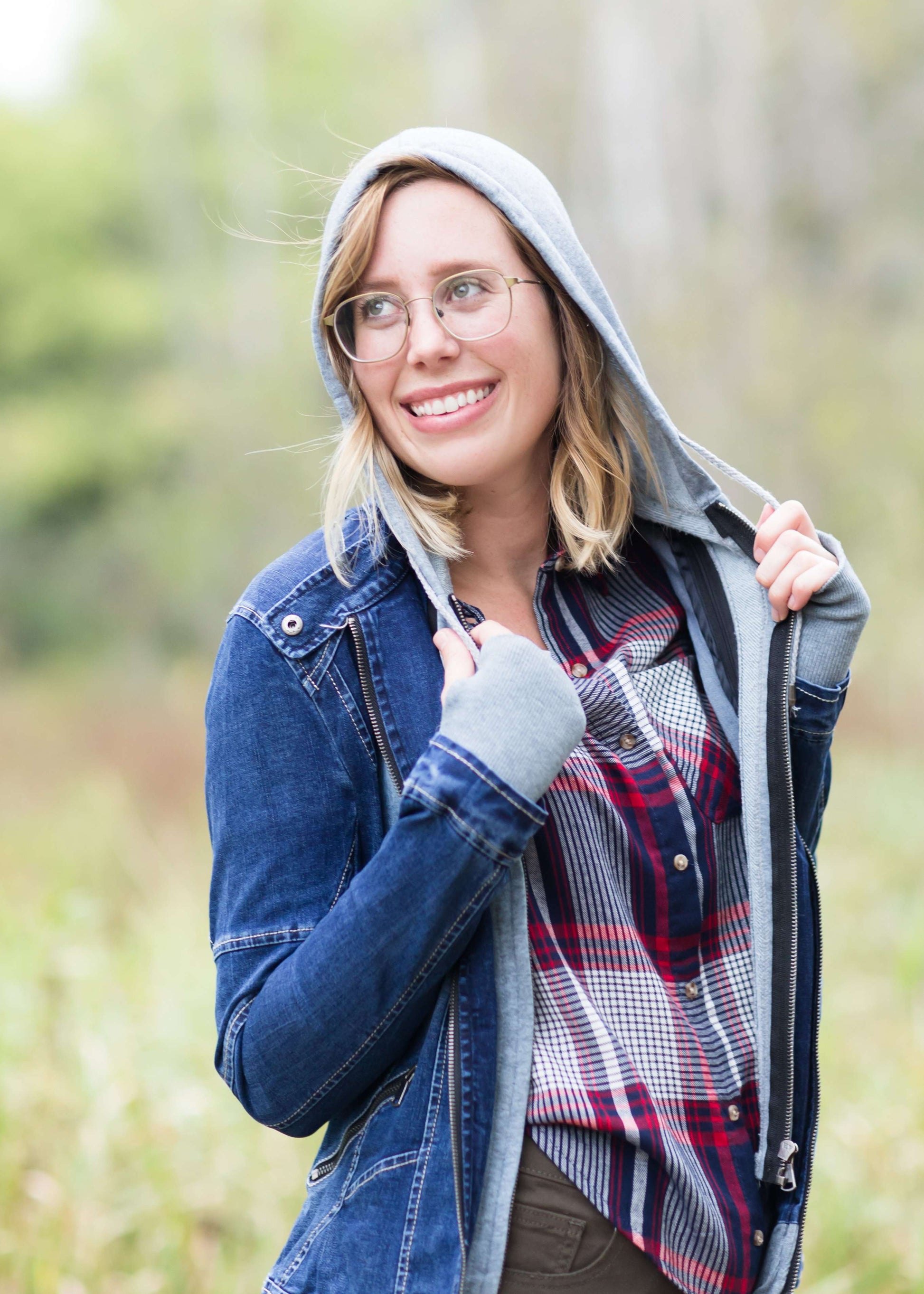 Denim front-zip jacket with removable gray front liner and hood.