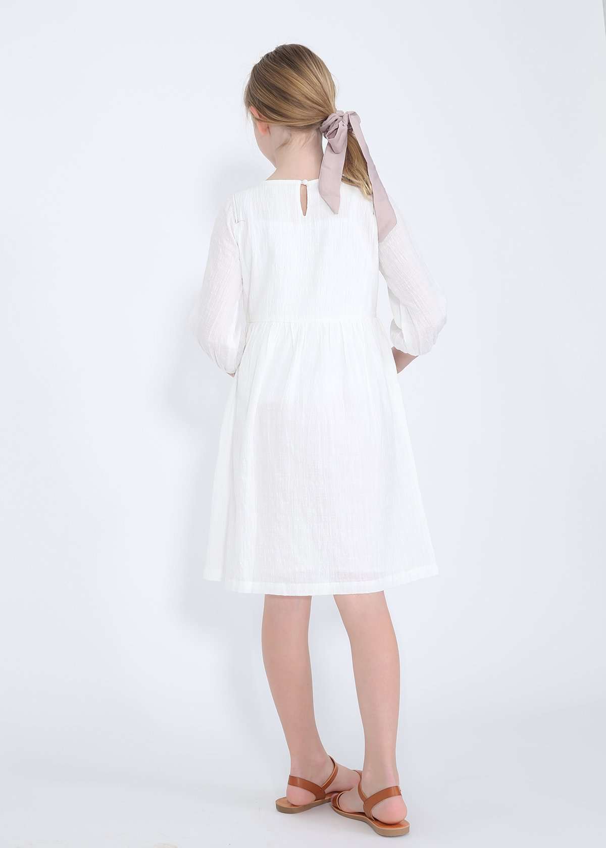 modest girls white peasant dress with pockets and buttons