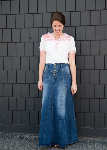 Long a-line denim skirt with a button detail