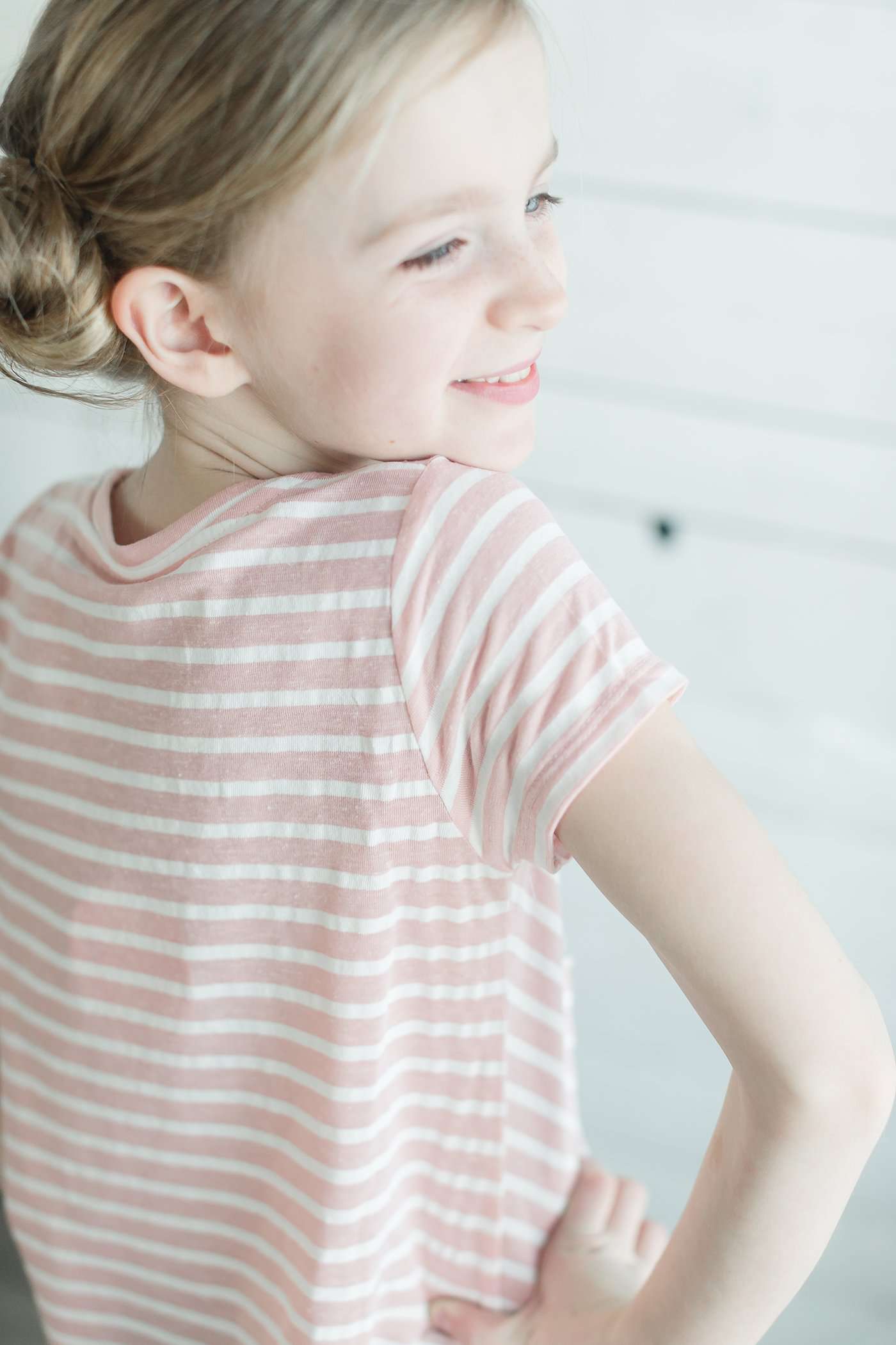 navy and white or pink and white striped girls short sleeve tee with raw edge front.