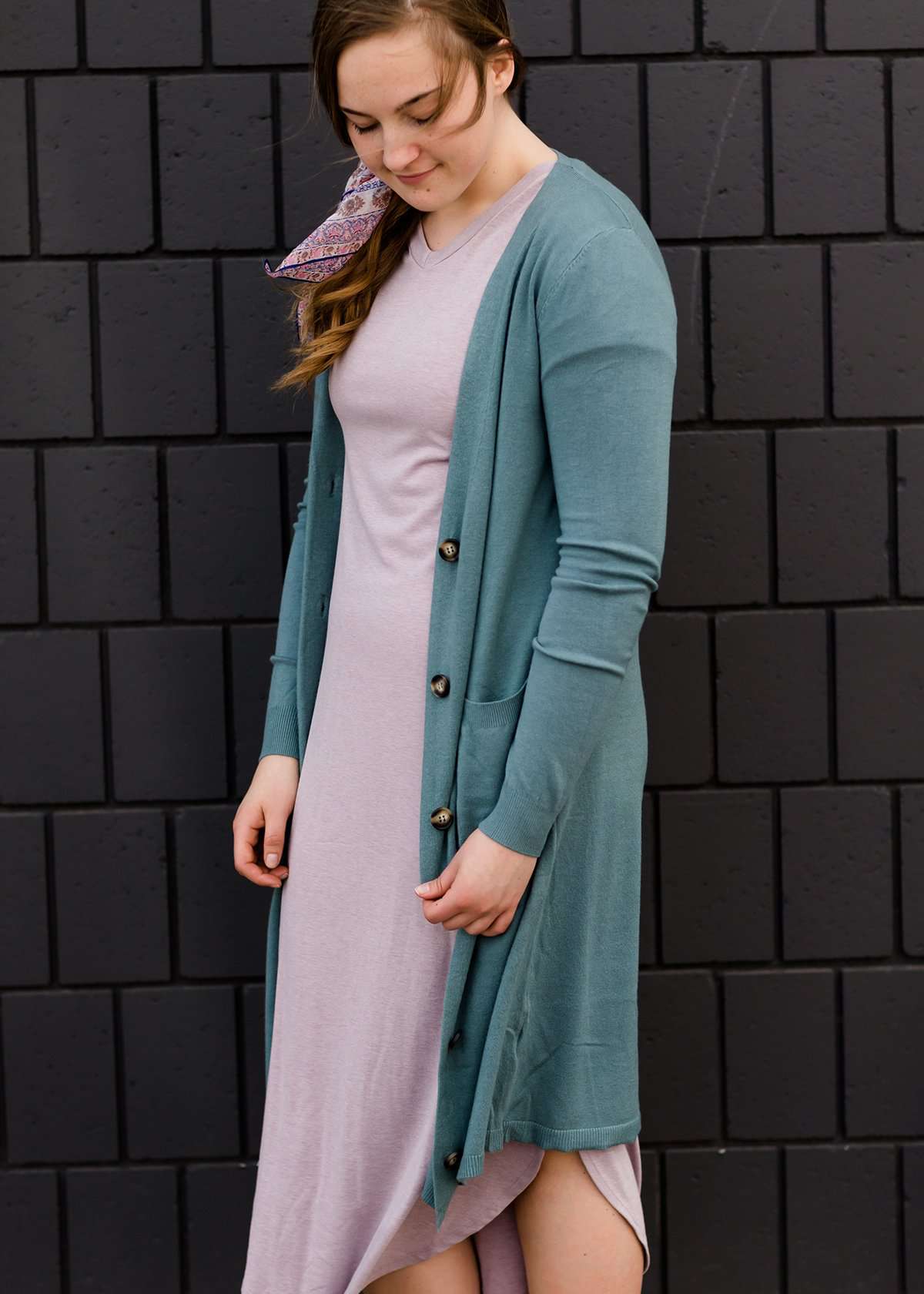 jade colored long double pocket button up cardigan