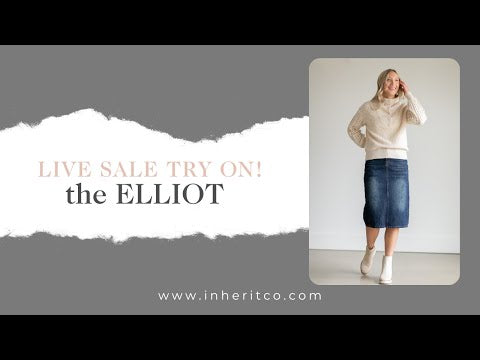 The Elliot Dark Was Midi Skirt is an Inherit Design you're going to wear year round! It has minimal monkey washing, a pink accent tab on the back pocket and a minimalistic dark denim that will be a closet staple! It is tailored in a straight cut with a slit in the back for maximum walkability! You're going to love dressing this up or throwing on to go run errands!