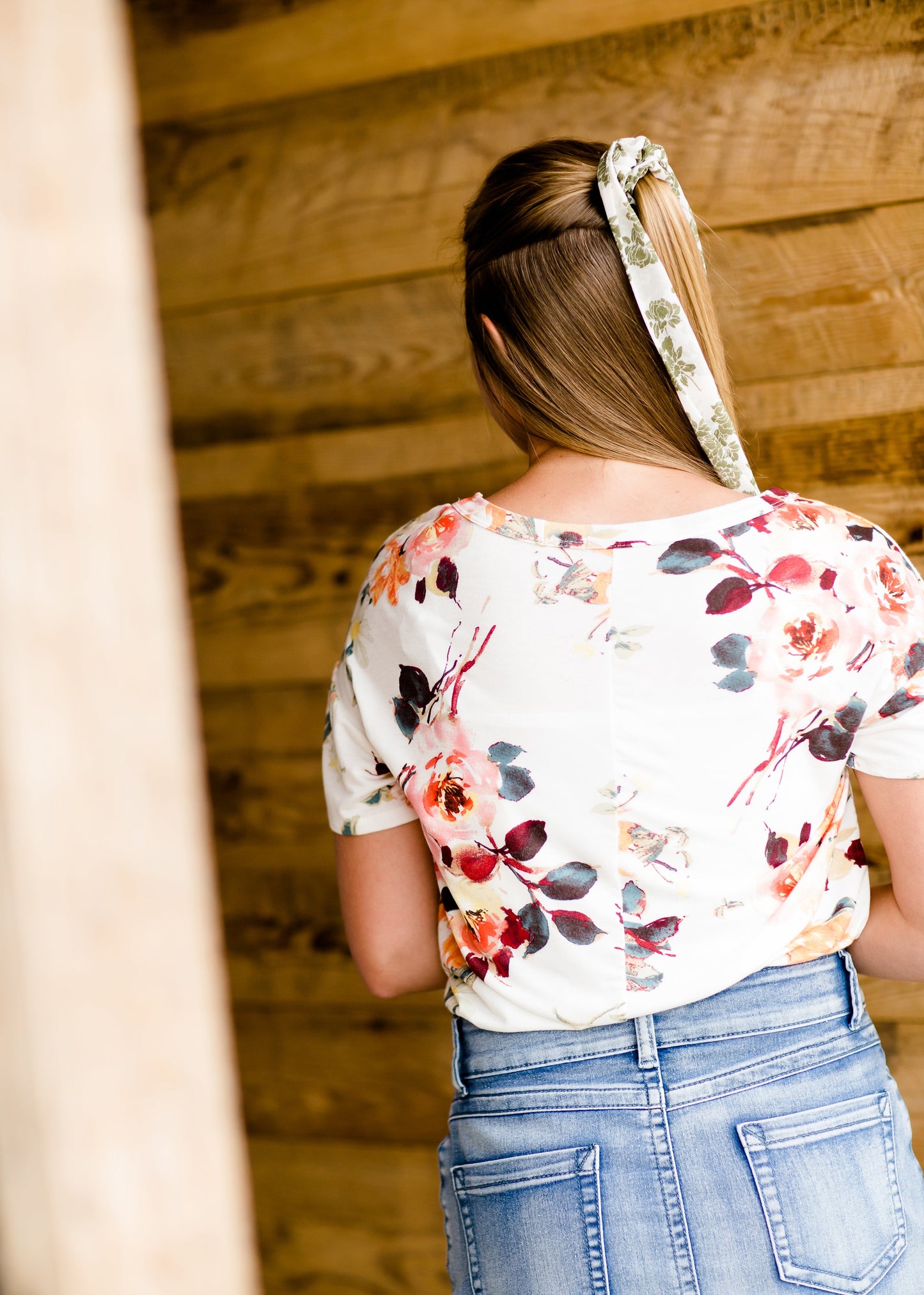 Modest cream tee with multi-colored floral detail 