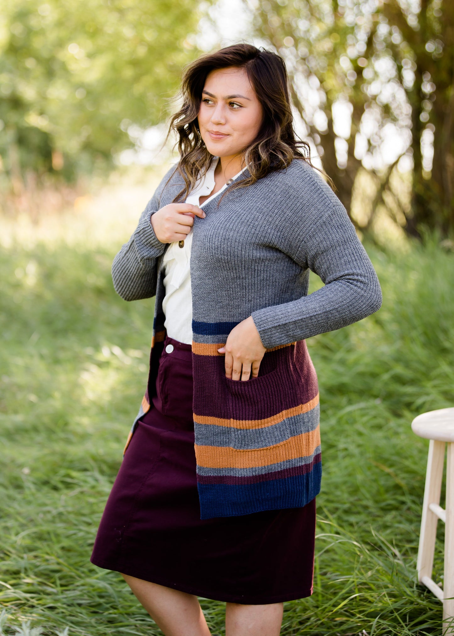 Long knit charcoal womens cardigan with orange and burgundy stripes