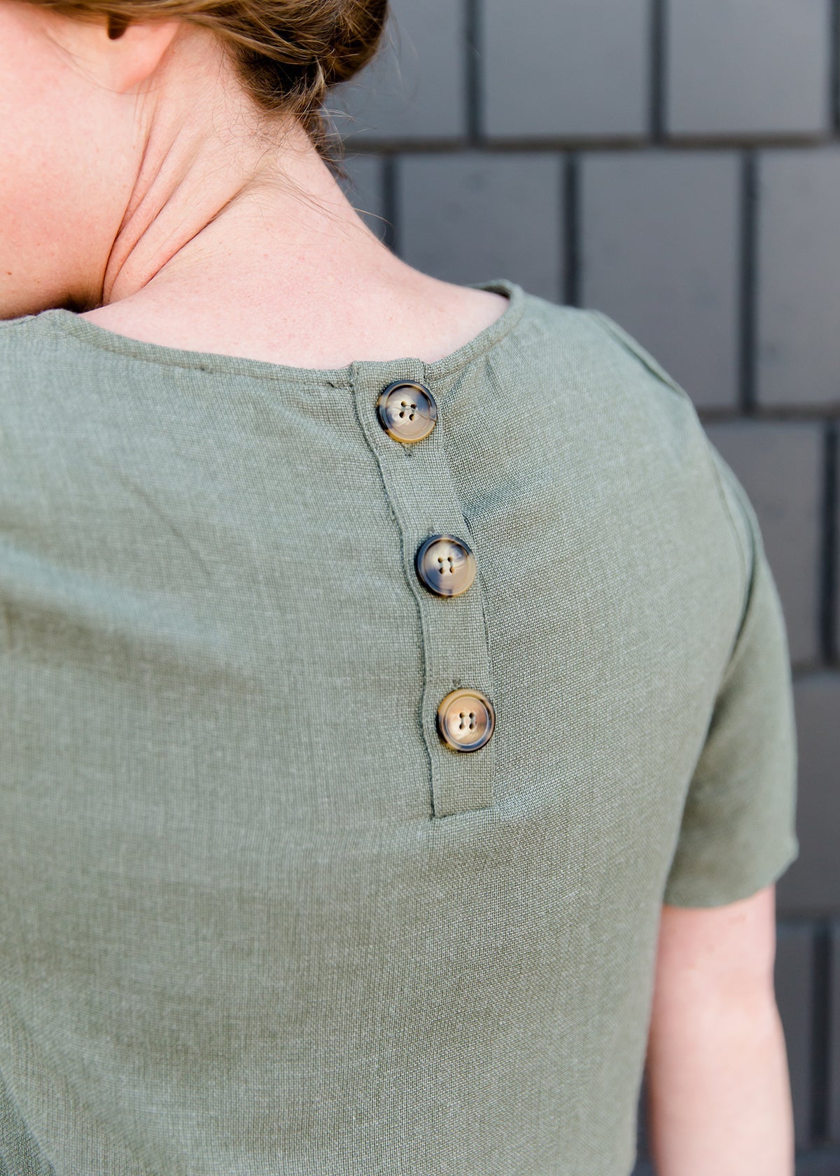 Olive blouse with a button detail