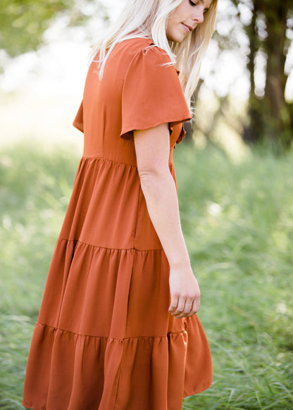 orange ruffle tiered midi dress